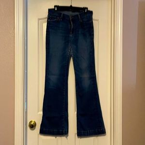 Lucky Brand flare bottom jeans.  Worn but no holes.
